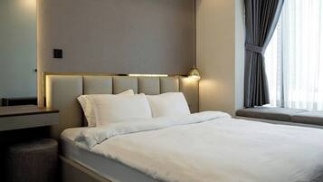 In-room safe, desk, laptop workspace, blackout curtains