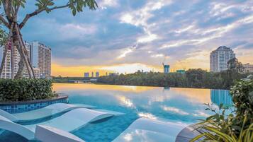 2 outdoor pools, pool umbrellas, pool loungers