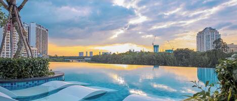 2 outdoor pools, pool umbrellas, sun loungers