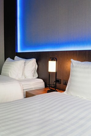 Luxe beddengoed, een gratis minibar, een kluis op de kamer