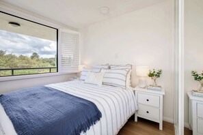 2 habitaciones, tabla de planchar con plancha, cuna de viaje y wifi 