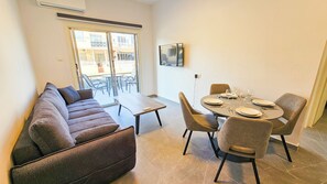 Comfort Apartment, Patio, City View | Living area | Flat-screen TV - La Magenta Apartments (Larnaca)