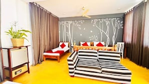 Chambre Triple Deluxe, vue piscine