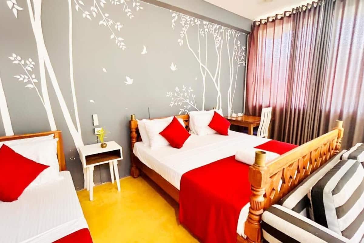 Deluxe Triple Room, Pool View | In-room safe, free WiFi, bed sheets