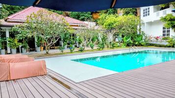 Outdoor pool, open 8:30 AM to 10:00 PM, pool umbrellas, pool loungers