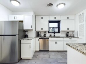 Fridge, microwave, oven, stovetop - Charming & Cozy Fort Worth Home w/ Yard, Near Downtown & Stockyards (Fort Worth)