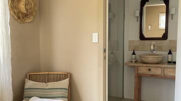 Shower, eco-friendly toiletries, hair dryer, towels