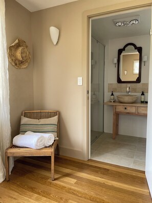 Shower, eco-friendly toiletries, hair dryer, towels