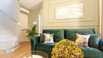 Apartment (2 Bedrooms) | Living room | 30-inch Smart TV with digital channels