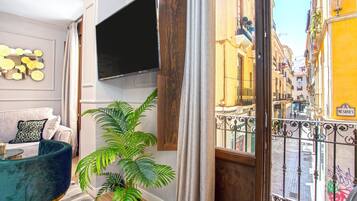 Apartment (1 Bedroom) | Living area | 30-inch Smart TV with digital channels