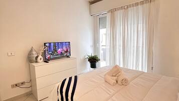 2 habitaciones, tabla de planchar con plancha, wifi y ropa de cama