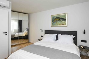 2 habitaciones, tabla de planchar con plancha, wifi y ropa de cama