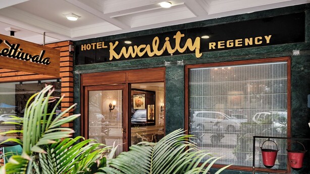 A hotel entrance with a sign reading "Hotel Kwality Regency". - Hotel Kwality Regency (Chandigarh)