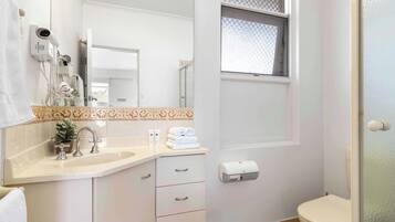 Shower, hair dryer, towels