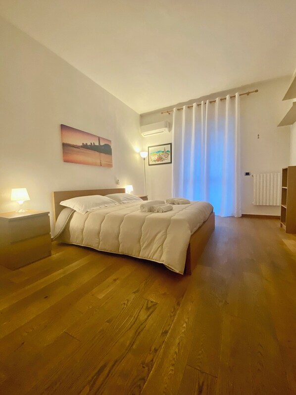 2 habitaciones, tabla de planchar con plancha, wifi y ropa de cama 