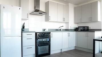 Apartment | Private kitchen | Fridge, microwave, oven, stovetop