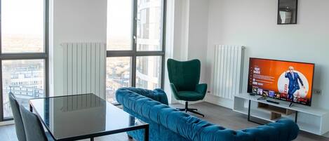 Apartamento | Área de estar | TV de tela plana