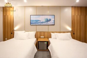 Deluxe Quadruple Room, Balcony, City View | In-room safe, desk, iron/ironing board, free WiFi - Elysees Hotel (Sam Son)