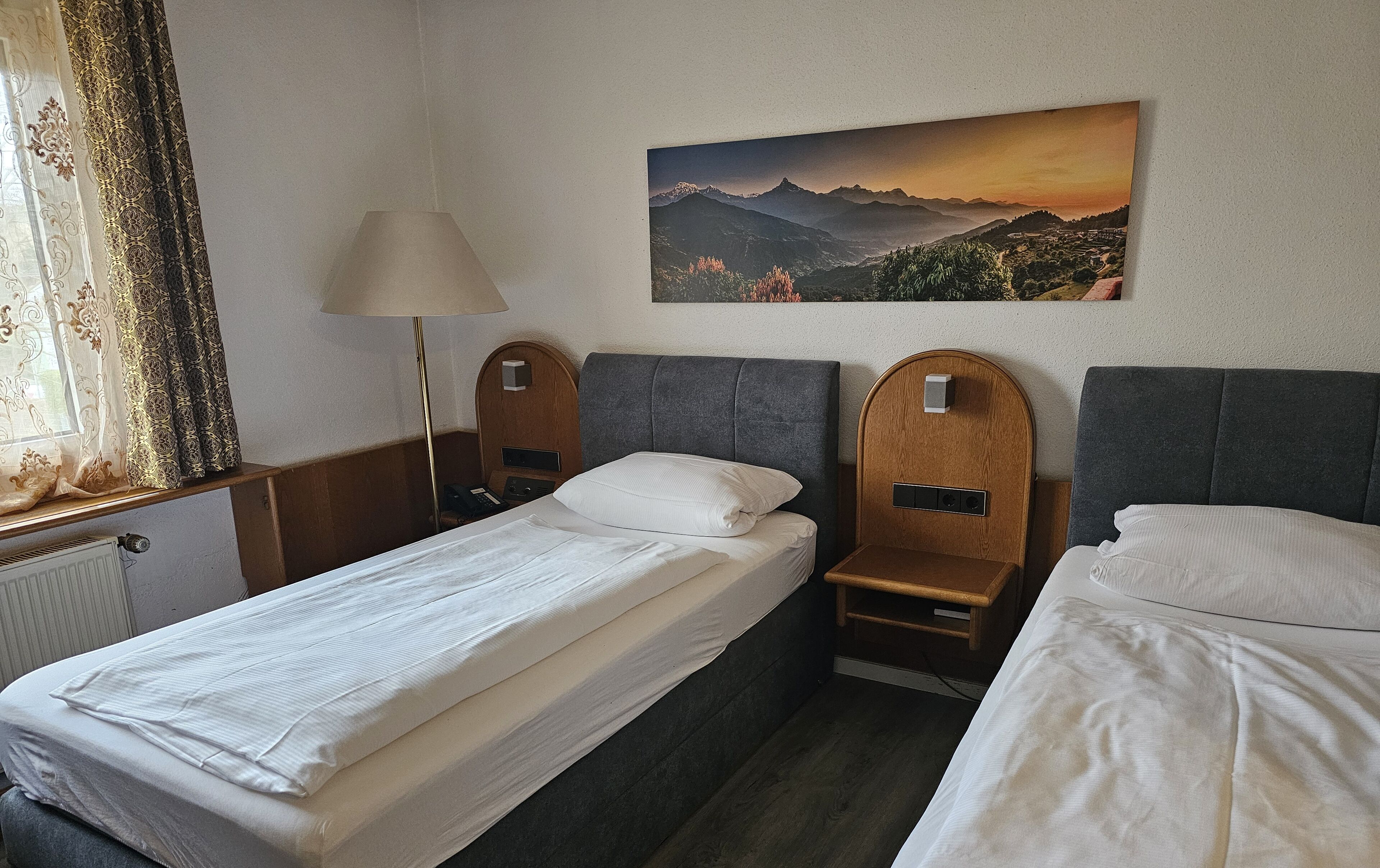 Basic-Zimmer, 1 Einzelbett, Nichtraucher | Schreibtisch, kostenloses WLAN, Bettwäsche