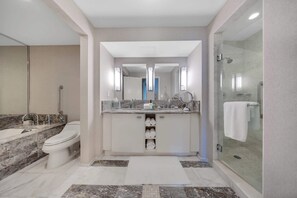 Shower, hair dryer, towels