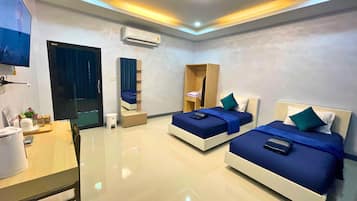 Habitación doble Deluxe, 2 camas individuales | Espacio para trabajar con laptop y wifi gratis
