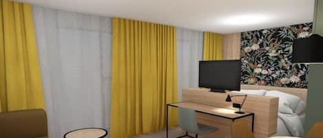 A hotel room with a bed, a desk with a computer, a TV, and a sofa.