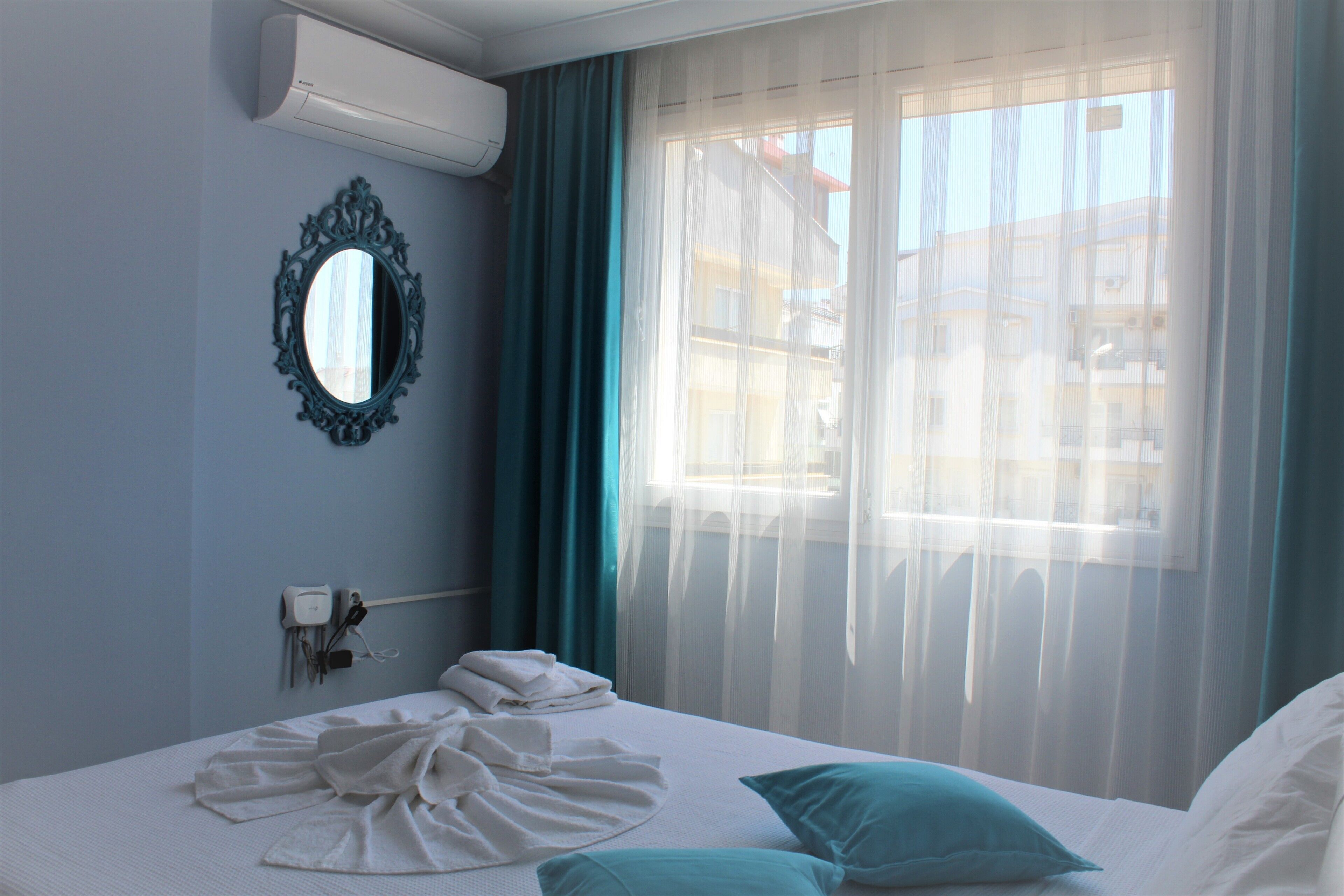 Economy Apartment, Balcony, Garden View | Desk, laptop workspace, iron/ironing board, free cots/infant beds