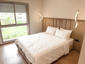 2 habitaciones, tabla de planchar con plancha, wifi y ropa de cama