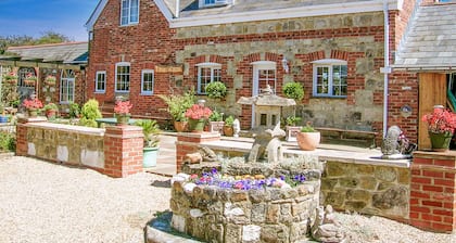 Cosy converted barn in rural location with views of the surrounding countryside.
