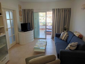 Apartamento, 1 quarto, para fumantes, piscina particular | Área de estar