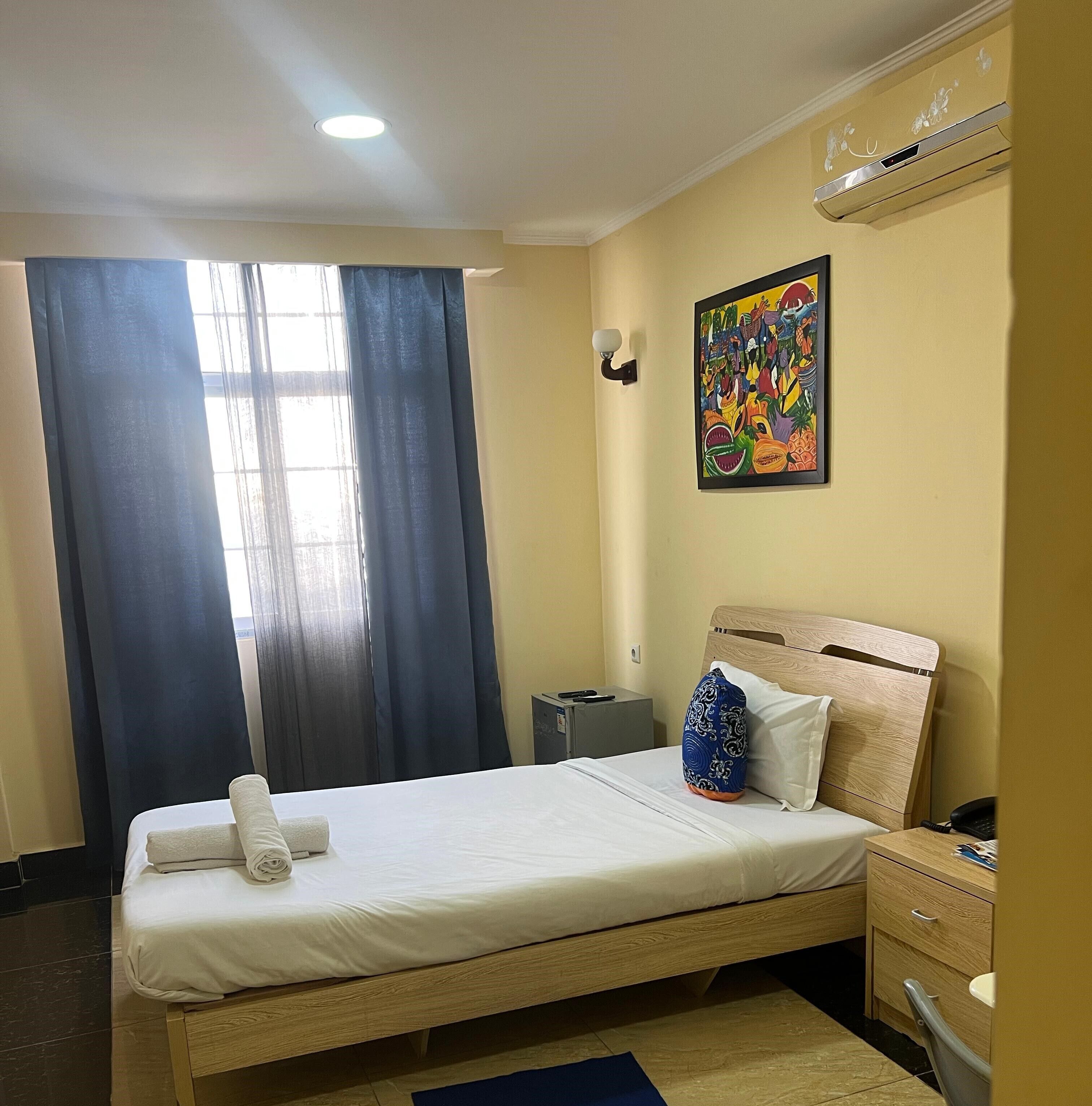 Egyptian cotton sheets, premium bedding, down comforters, in-room safe