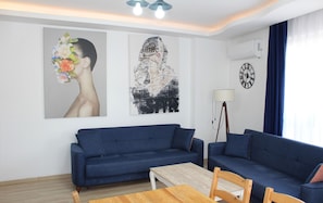 Economy Apartment, Balcony, Garden View | Living area | 82-inch LED TV with satellite channels - Mavi Restaurant & Apartments 2 (Didim)