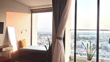 Family Studio Suite, Balcony, City View | Blackout drapes, soundproofing, iron/ironing board, free WiFi