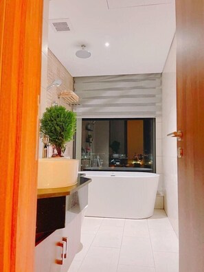 Family Studio Suite, Balcony, City View | Bathroom | Hair dryer, slippers, towels, soap - Kira Kira 's Apartment (Tuy Hoa)