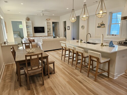 The Seashelle is a New Four Bedroom, Four ½ Bath home with a Pool.
