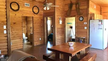 Cottonwood Cabin | Porch & Dark Skies | Living area
