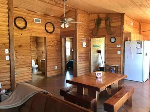 Cottonwood Cabin | Porch & Dark Skies | Living area