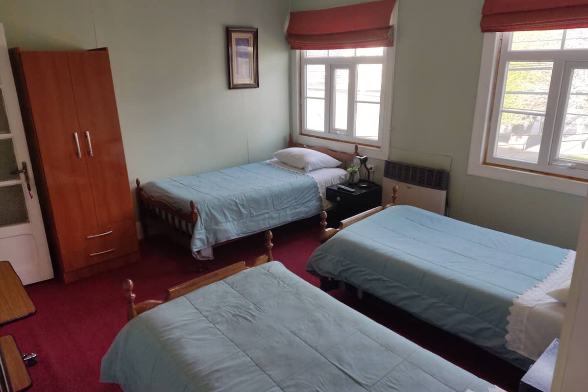 Superior Triple Room, City View | Down comforters, laptop workspace, iron/ironing board (on request)