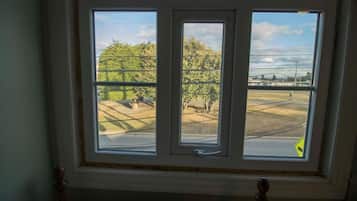 Superior Triple Room, City View | Down duvets, laptop workspace, iron/ironing board, free WiFi