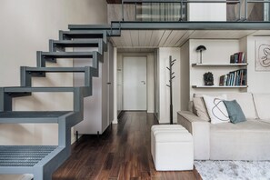 Superior Apartment, City View | Living area | Flat-screen TV