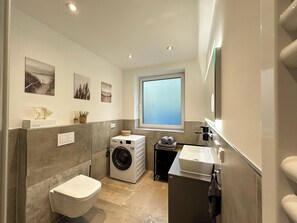 Shower, hair dryer, towels, soap