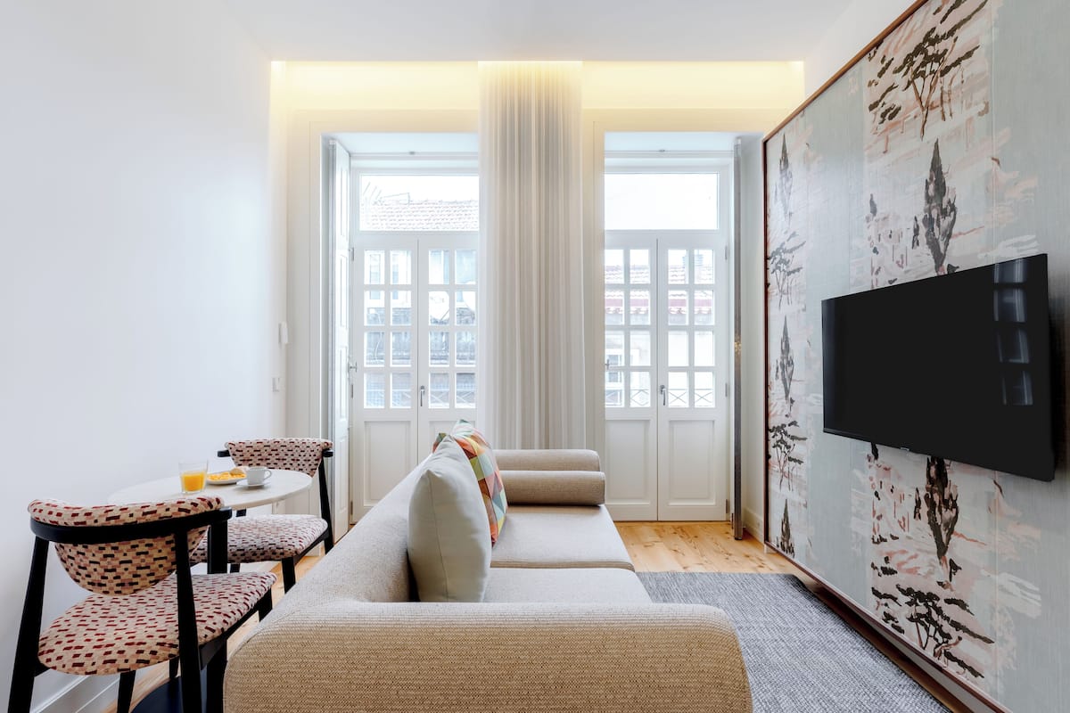 Design-Apartment | Wohnbereich | Fernseher