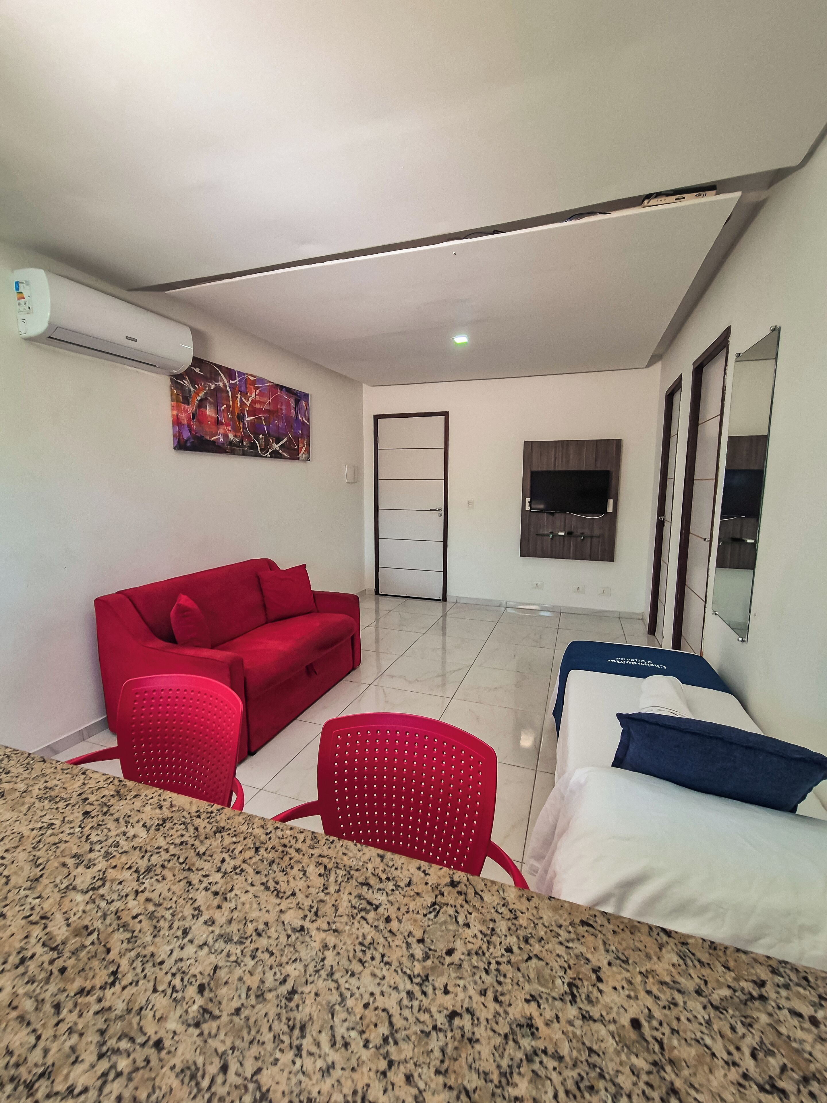 Apartamento (2 Quartos) | Área de estar | TV de tela plana