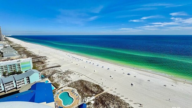 A beach resort with a pool, beach, and ocean view. - Brand New Phoenix Gulf Tower 2507 /Lazy River/Beach
Your Vacation Getaway! (Orange Beach)