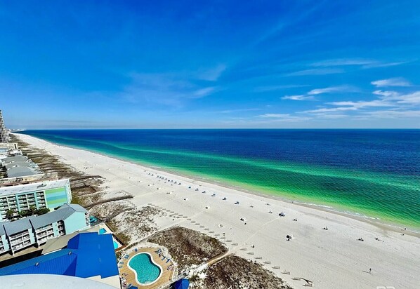On the beach, sun loungers, beach towels