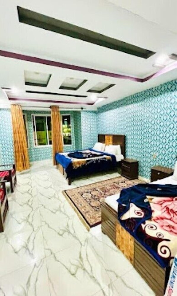 Deluxe Double Room, Mountain View | Soundproofing, iron/ironing board, free WiFi - Hotel Spring Land Naran (Balakot)