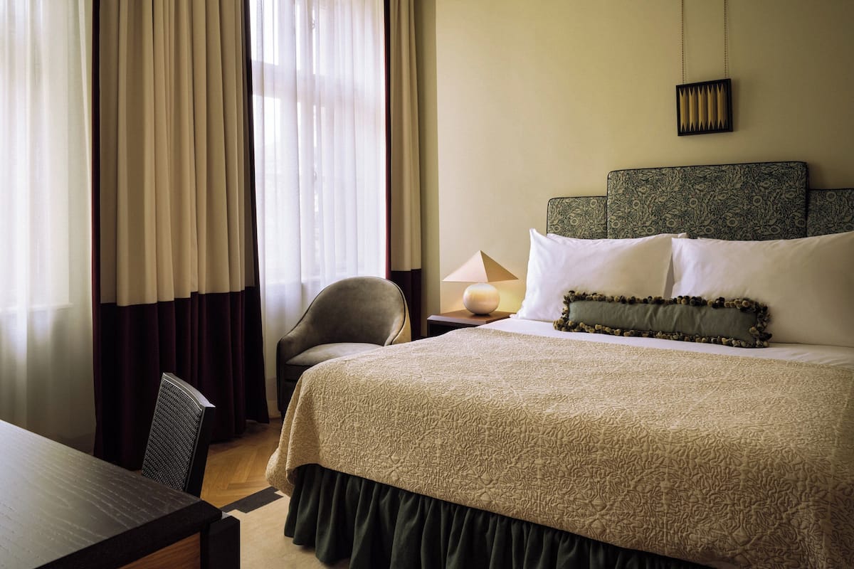 Premium bedding, down duvets, minibar, in-room safe