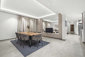 Royal Apartment | Living area | 50-inch Smart TV with digital channels - Silkhaus Rose Residency 36 (Riyadh)