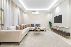 Exclusive Apartment | Living area | 50-inch Smart TV with digital channels - Silkhaus Wakan 001 (Riyadh)
