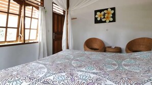 A room with a bed, two wicker chairs, a window with curtains, and a wall with a flower painting. - Bagus Bay Homestay (Tuktuk Siadong)